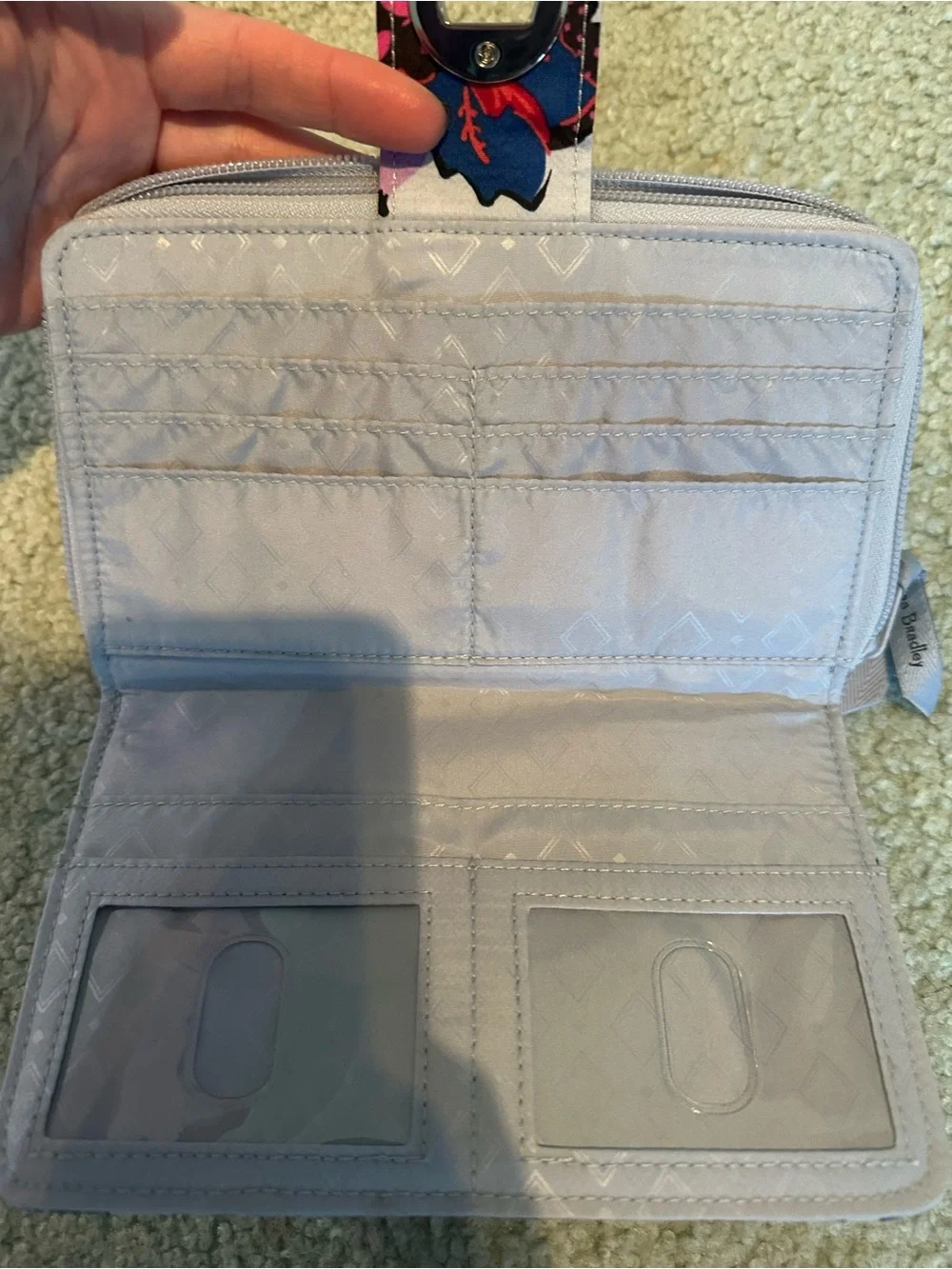 Vera Bradley holds access floral